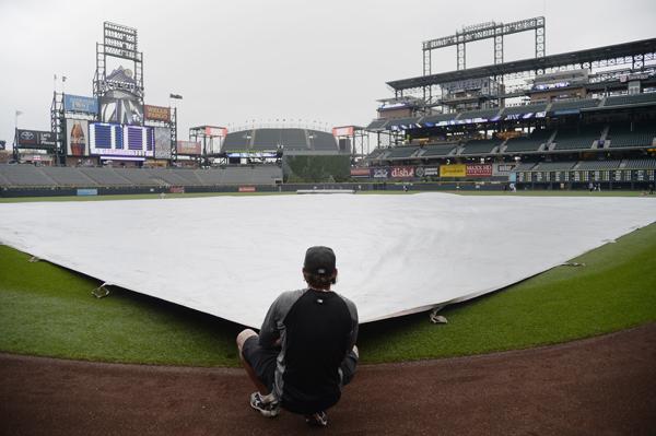 It was a rainy, depressing week at Coors Field. Photo Credit: John Leyba - The Denver Post